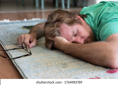 Tired Man Taking A Nap At Home From Work.