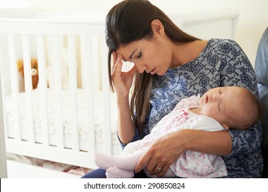 Tired Mother Suffering From Post Natal Depression