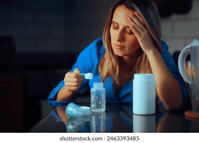 
Tired Mother Waking up to prepare Formula for Night Feed 
Exhausted mom making soluble milk drink for her infant 
 - Powered by Shutterstock