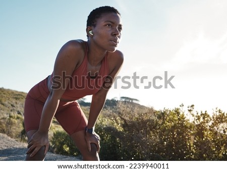 Tired, motivation and black woman running in nature, training exercise and fitness idea in Morocco. Breathing, relax and African runner thinking of a mountain workout, sports and cardio start