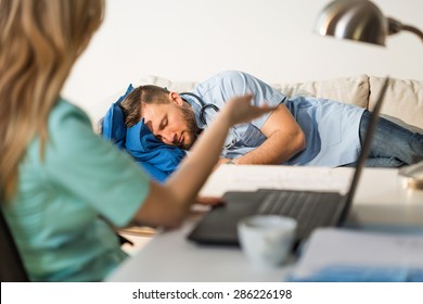 Tired Nurse Is Arguing With Sleepy Doctor