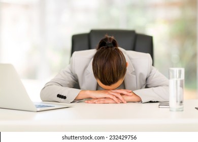 tired office worker sleeping at work