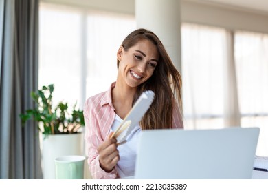 Tired Overheated Young Woman Hold Wave Fan Suffer From Heat Sweating Indoor Work On Laptop At Home Office, Annoyed Woman Feel Uncomfortable Hot Summer Weather Problem No Air Conditioner Concept