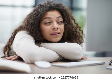 Tired overworked woman resting at workplace in office - Shutterstock ID 2227796655