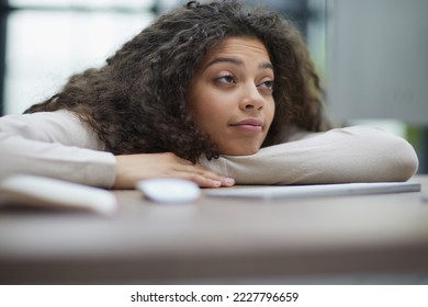 Tired overworked woman resting at workplace in office - Shutterstock ID 2227796659