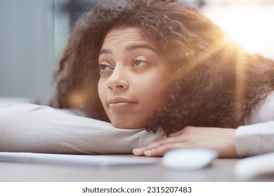 Tired overworked woman resting at workplace in office - Shutterstock ID 2315207483