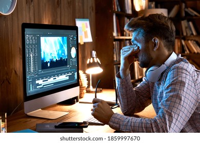 Tired overworked young business man taking off glasses rubbing tired dry eyes after long pc computer work late at dark night, having vision problem, bad sight, feeling eyestrain fatigue pain concept. - Shutterstock ID 1859997670