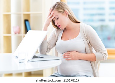 Tired Pregnant Woman Working