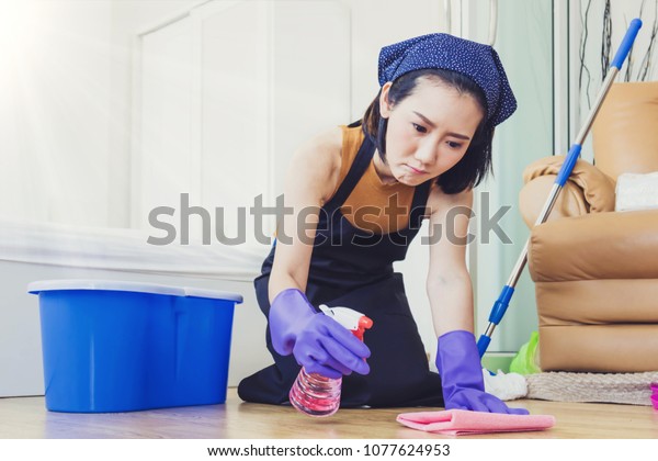 Tired Sad Asian Housewife Cleaning House Stock Photo Edit Now 107762