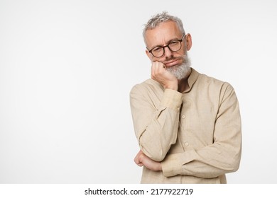 Tired sad ill bored caucasian mature middle-aged man wants to sleep, feeling negative emotions, toothache depression emotional burnout isolated in white background - Shutterstock ID 2177922719
