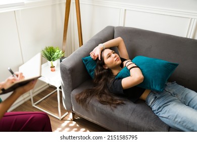 Tired Sad Teen Girl Resting On The Couch During A Therapy Session To Get Help And Advice For Her Mental Health