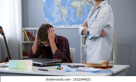 Tired Schoolboy Sitting Table, Strict Scolding Mother Standing Aside, Control