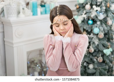 Tired Sleepy Kid. Fancy Girl In Luxury Decorated Interior. Happy Childhood. Child Enjoy Winter Holidays. Glamorous Girl Celebrate Christmas. Host Amazing Christmas Party At Home. Waiting Christmas.