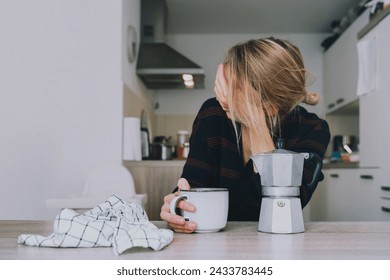 Tired sleepy person female having some problems. Exhausted woman with coffee at home. Сoncept of woman or mother in depression, burnt out, tired from work or study, unsatisfactory with her life. - Powered by Shutterstock