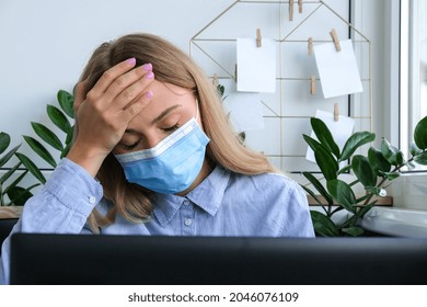 Tired Sleepy Young Caucasian Woman Worker Wearing Medical Face Mask At Desk Workplace. Overworking And Sleeping Deprivation. Headache Freelancer In Depression. Cold And Sick At Workspace