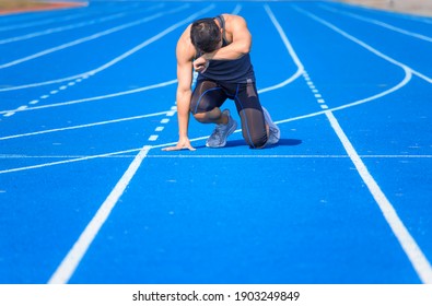 Tired Sport Man Exhausted Breathing  After Running And Training