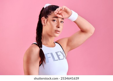 Tired, tennis player or portrait of woman in studio for sports game match workout or exercise. Pink background, girl or athlete with fatigue for playing, fitness training or practice in Switzerland - Powered by Shutterstock