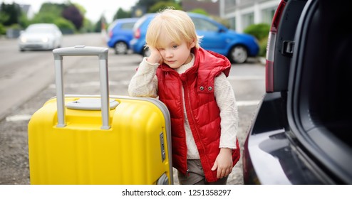 Tired Toddler Boy Ready For Going To Road Trip With His Parents. Automobile Trip In The Countryside. Roadtrip For Family With Little Kids