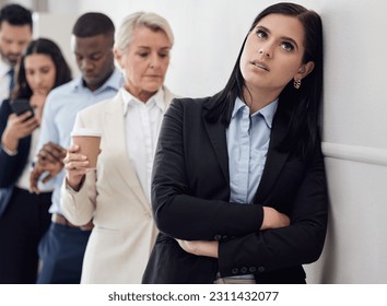 Tired, waiting room and woman in line for business interview, job application or hiring opportunity in corporate company. Group, people and frustrated person in queue, appointment and anxious time