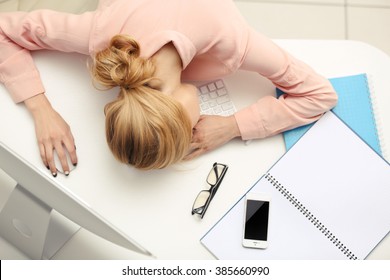 Tired Woman At The Computer In Office