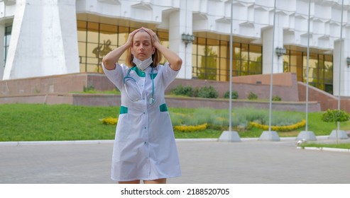 Tired Woman Doctor Walking Near Clinic, Slow Motion Shot