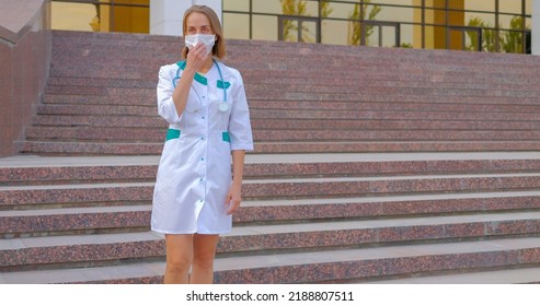 Tired Woman Doctor Walking Near Clinic, Slow Motion Shot