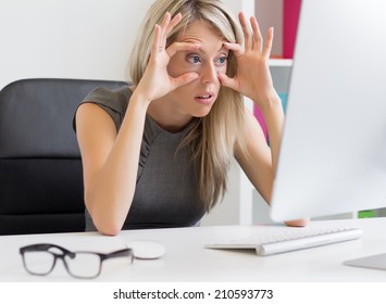 Tired Woman In Front Of Computer