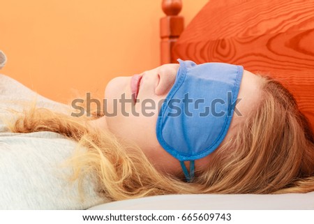 Tired Woman Sleeping In Bed Wearing Blindfold Sleep Mask Young Girl Taking Nap Tired Woman Sleeping In Bed Wearing Blindfold Sleep Mask Young Girl Taking Nap