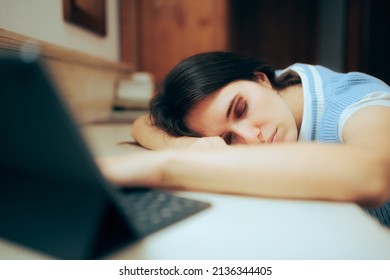 Tired Woman Working from Home Sleeping on the Desk. Exhausted office worker suffering from burnout and depression falling asleep at work
