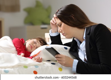 Tired Worker Mother Wearing Suit After Work While Her Daughter Is Sleeping On A Bed In A House Interior