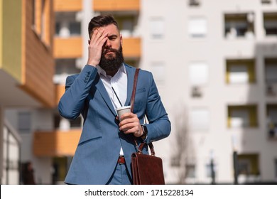 Tired Young Buisness Man Walking Outdoor