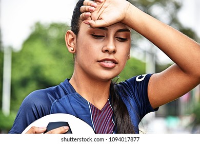 Tired Young Female Teen Soccer Player