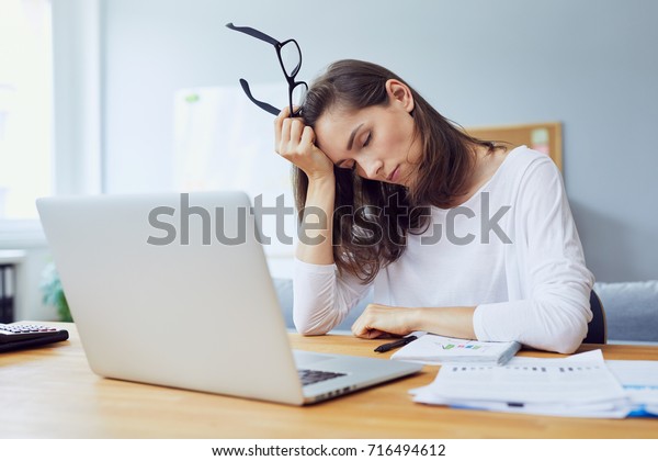 Tired Young Office Worker Falling Asleep Stock Photo Edit Now