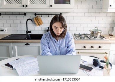 Tired Young Single Mother Feeling Stressed Because Of Financial Problems, Working Through Finances In Kitchen, Doesn't Have Enough Money To Pay Off Mortage Debt