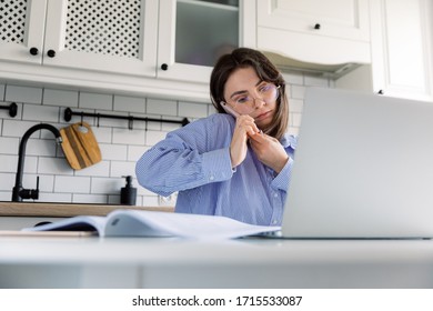 Tired Young Single Mother Feeling Stressed Because Of Financial Problems, Working Through Finances In Kitchen, Doesn't Have Enough Money To Pay Off Mortage Debt