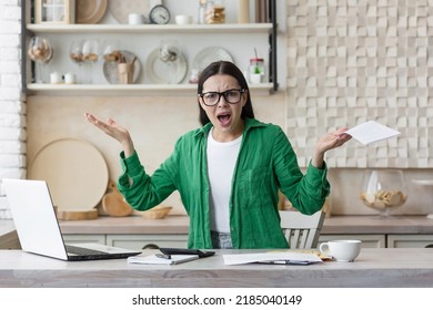 Tired Young Single Mother Feeling Stressed Because Of Financial Problems, Working Through Finances In Kitchen Late At Night, Doesn't Have Enough Money To Pay Off Mortage Debt