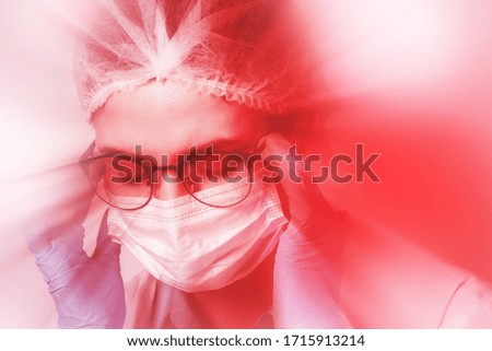 Tiredness or sickness. Young female doctor with a headache