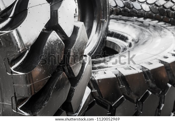 tires are big truck, tractor or bulldozer.\
Background of tyre