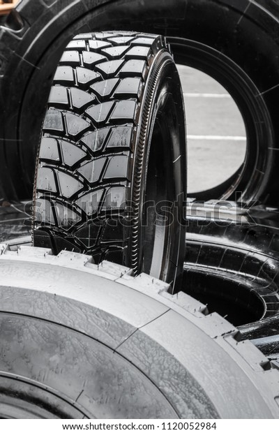 tires are big truck, tractor or bulldozer.\
Background of tyre