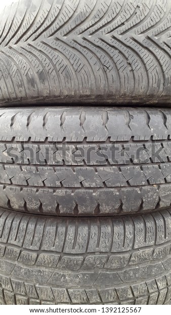 Tires. Car tires. Rubber. Old car tires. Tread. Car\
wheel protector close up
