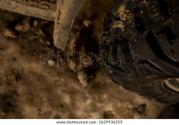 tires in the mud on\
mountain
