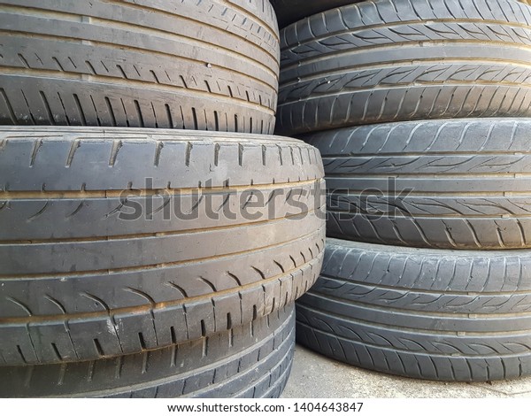 Tires stacked\
in rows and have a variety of designs and Tires are responsible for\
the weight of the car and luggage, which is the only part of the\
car that touches the\
road.