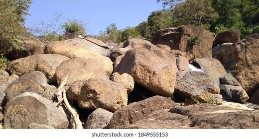 Tirtomoyo, Indonesia - June 18, 2018: Rocks in the river - Shutterstock ID 1849555153