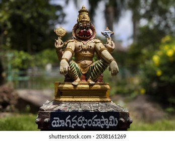 TIRUMALA-ANDHRA PRADESH, INDIA - Jul 10, 2021: close view of Lord Sri Yoga narasimha swamy idol isolated in Natural rock garden in Tirumala: Tirumala, Andhra Pradesh, India-July 10 2021