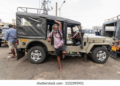 Tirupati, Andhra Pradesh, India - September 2018: An Indian Jeep Driver Standing Outside His Vehicle Waiting For Passengers.