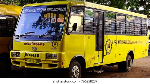TIRUPPATUR, INDIA - MARCH 28th, 2016: Yellow School Bus in India. Two school buses