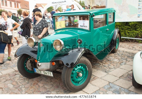 TISNOV, CZECH REPUBLIC - SEPTEMBER 3, 2016:  The\
traditional meeting of fans of vintage cars and motorbikes. An\
exhibition of old cars in the town square of Tisnov. Detail of\
veteran cars. \
