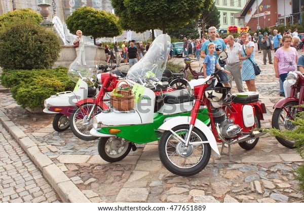 TISNOV, CZECH REPUBLIC - SEPTEMBER 3, 2016:  The\
traditional meeting of fans of vintage cars and motorbikes. An\
exhibition of old cars in the town square of Tisnov. Detail of\
veteran cars. \
