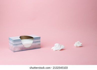 Tissue Box With Tissues With A Pink Background