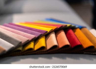 Tissue catalog. Catalog of multi-colored fabric samples. Textile industry background. Colored cotton fabric. Tissue catalog. Selects the color of the sofa. Textile industry background. Palet - Shutterstock ID 2126570069